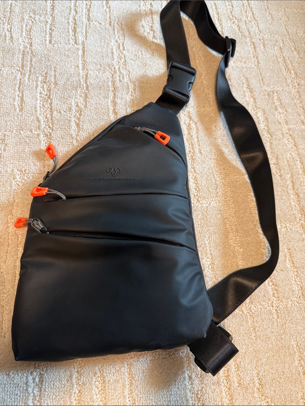 Black Men's Sling Crossbody Bag with Orange Zipper Accents